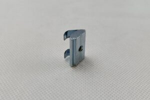 Sliding block, attached spring