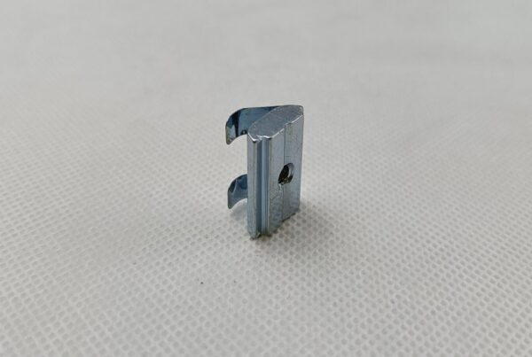 Sliding block, attached spring